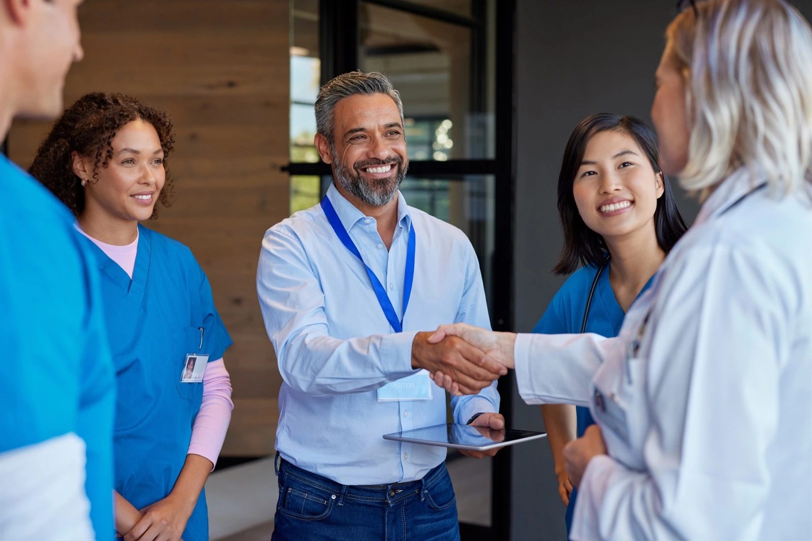 Care team greeting a partner