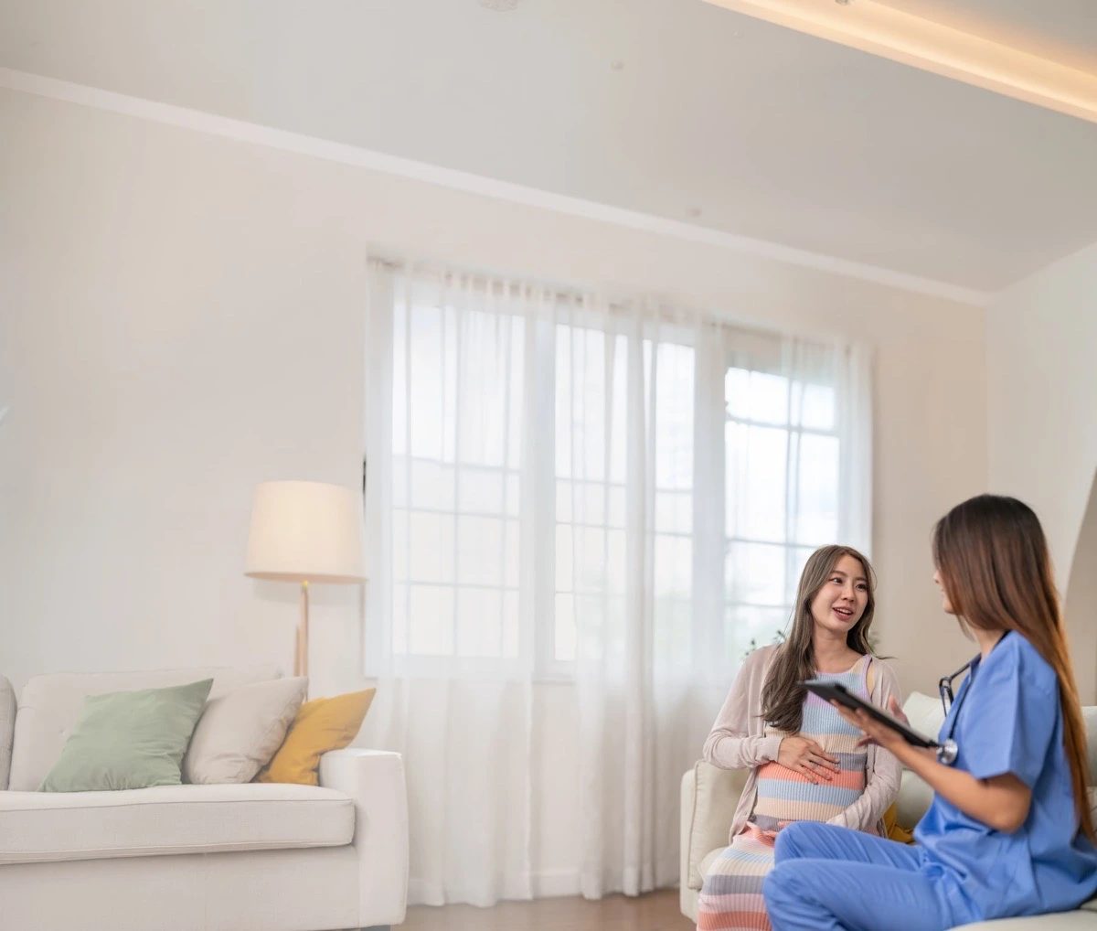 Care coordinator meeting with a patient