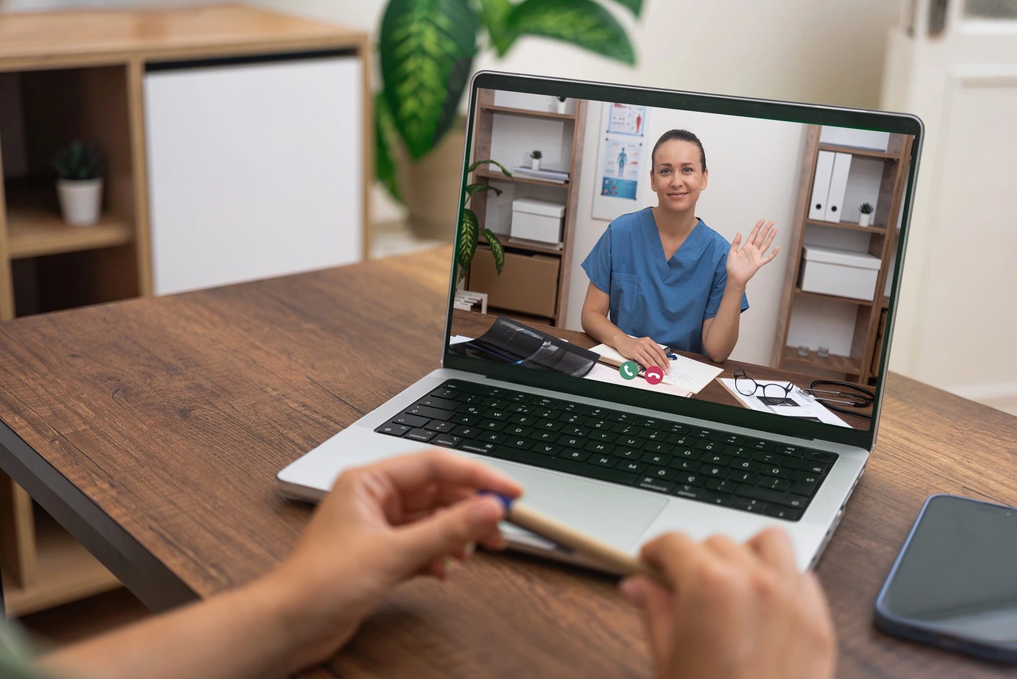 Virtual care coordinator meeting on a laptop